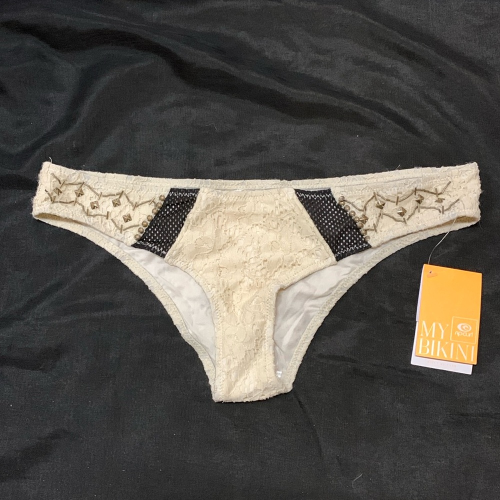 Ripcurl cream color high-cut bikini swim bottom. NWT.  Size L.
